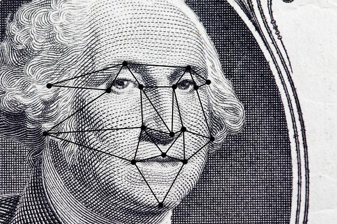 Лицето на президента върху доларова банкнота с картографирани модели за разпознаване на лицето